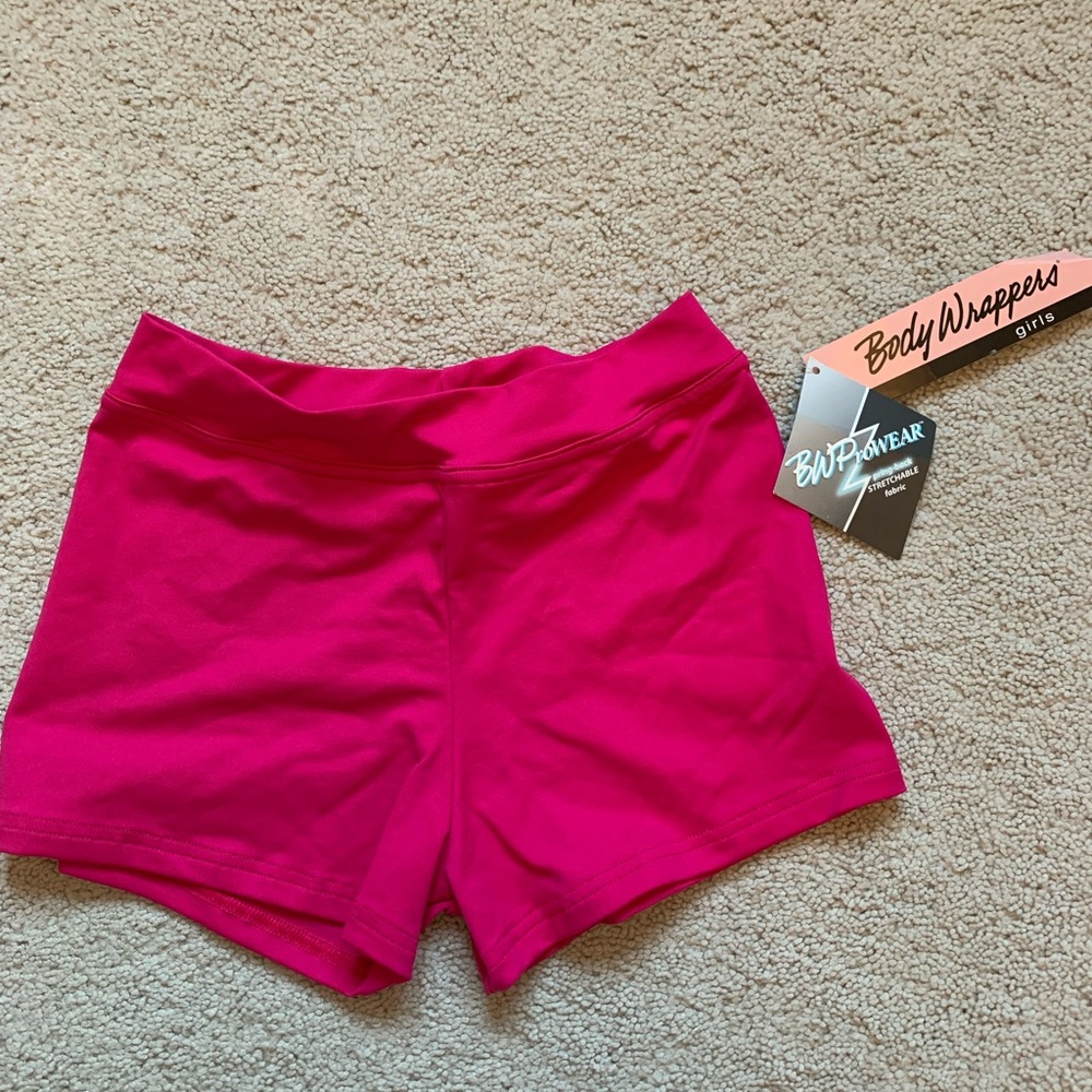 These are pink activewear shorts perfect for kids! They are soft and stretchy!